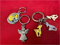 3 KEYCHAINS INCL. PACKERS