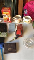 Dry cutter, glasses cases, 2 lg cups, gloves,