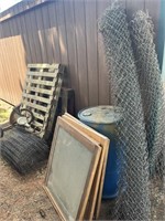 Rolls of wire, pallets, windows, other misc