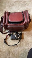 Vintage Pentax camera in bag with accessories (