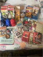 Teen books, baseball helmets, football helmets,