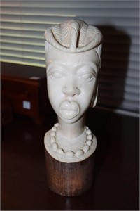 African carved woman bust