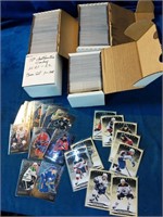 4 boxes of quality cards. Boxes are labeled