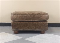 Brown leather ottoman