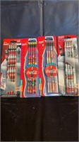 4 packages of different coca-cola pencils