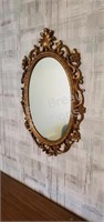 Vintage ornate gold frame oval wall mirror