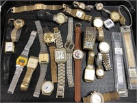 Tray of assorted watches.