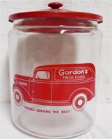 Large glass Gordon's Foods display jar