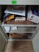Plastic 2 door storage cabinet & contents