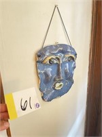 Face wall hanging