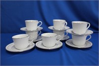 Eight Noritake "White Scapes" cups & saucers