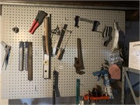 WALL OF TOOLS, LEVELS, PIPE WRENCH, CLAMP,