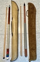Two 2-piece pool cues with travel cases