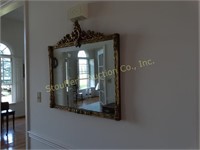 Gold frame wall mirror 30" H