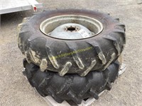E2. (2) 14.9x28 tractor wheels tires