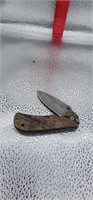 Small camo pocket knife