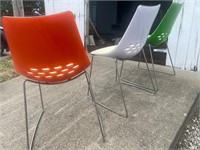 3 plastic contemporary chairs