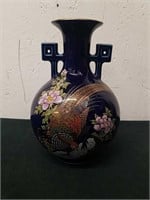 Vintage 8 in Oriental vase