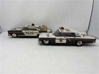 2 Battery Operated Tin Lithographed Police Cars