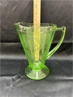 Green depression glass pitcher