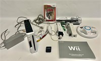 WII console with accessories + Zelda game.