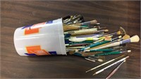 BUCKET OF PAINT BRUSHES