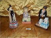 Trio of porcelain figurines