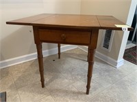 DROP SIDE WOOD TABLE WITH ONE DRAWER