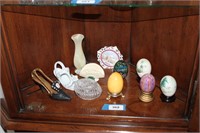 4TH SHELF of corner cabinet, eggs, shoes, candle