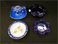 Four ashtrays including porcelain Made in