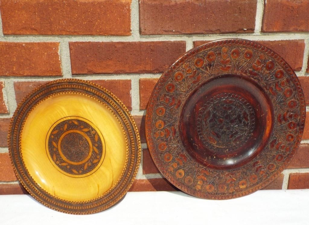 Two hand carved vintage wooden deco plates. 12"