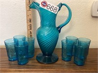 Blue pitcher and 8 glasses