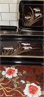 4 BLACK TRAYS WITH FLORAL DECORATION