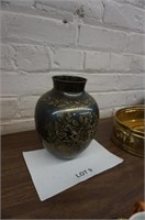 solid black brass vase with carved floral decor