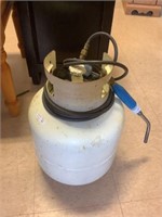 Propane torch with tank approximately half full