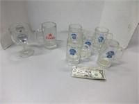 Assorted vintage beer mugs and glasses