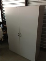 Large white cabinet wardrobe. Particle board