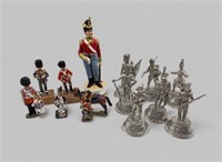 COLLECTION OF MILITARY GUARD FIGURINES