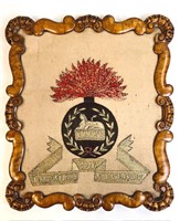 ANTIQUE MILITARY WOOLWORK IN TIGER MAPLE FRAME