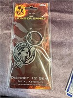 NIP Hunger Games District 12 Seal Metal Keychain