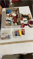 Christmas figurines, various sewing accessories.