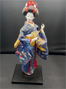 Vintage geisha doll