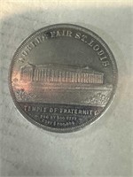 The St. Louis World Fair token, 1904, showing the
