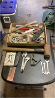 Level, drill bits, wrenches, box cutter, outlet