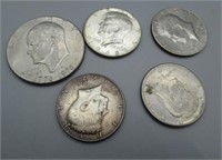 (2) 40% silver Kennedy half dollars, (2) clad
