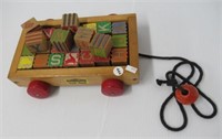 Vintage Fritzel Toys wagon with wood blocks.