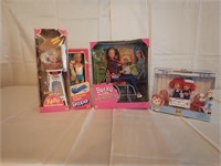 Four Mattel dolls: