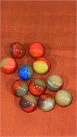 11 uranium base patch type marbles  5/8 to 11/16”