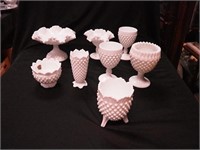 Eight pieces of hobnail milk glass: water