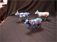 Three Cow Parade figurines: item No. 9181 Puzzle